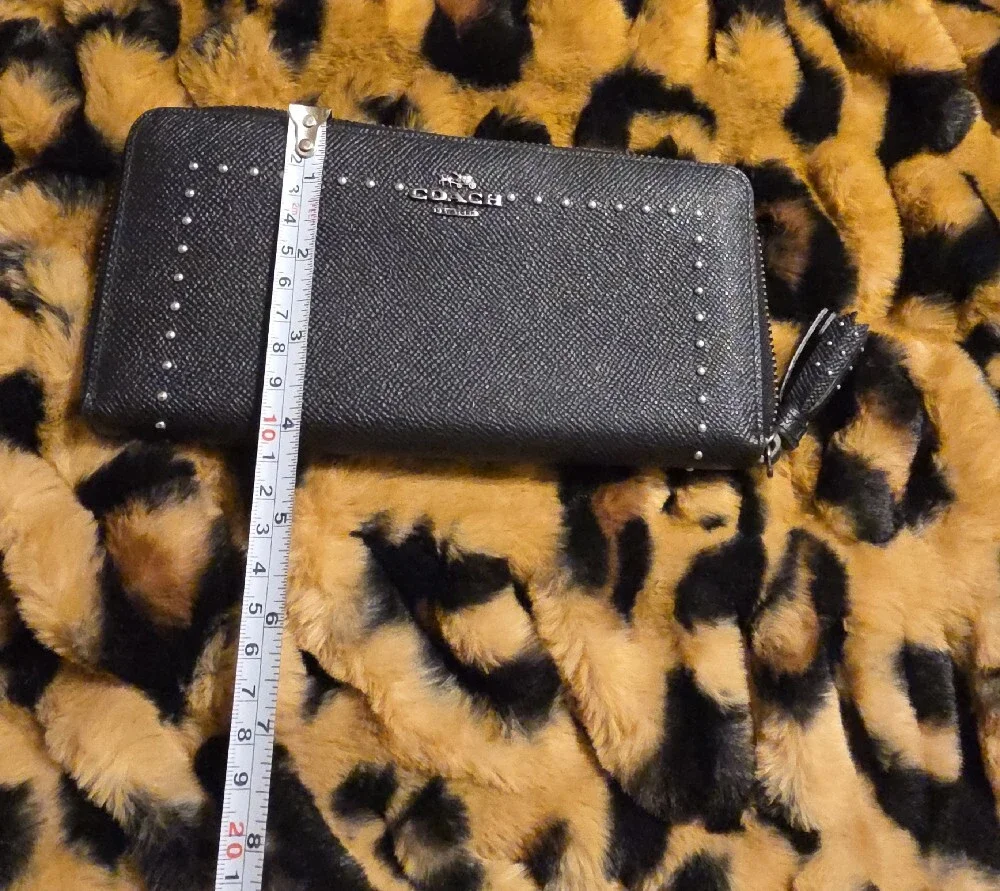 Coach sleek zip